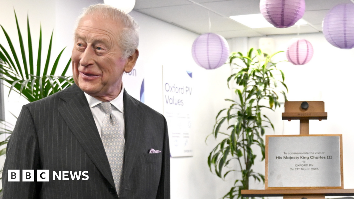 King Charles III laughs after he unveiled a plaque which accidentally fell to the floor during a visit to Oxford Photovoltaics Limited (Oxford PV), a trailblazing Oxfordshire enterprise developing advanced solar panels capable of converting more of the sun's spectrum into clean, affordable energy.