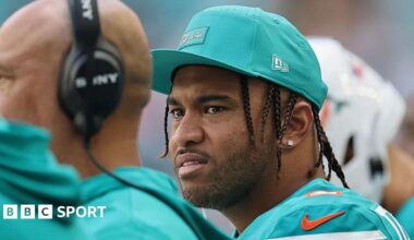 Tua Tagovailoa looks on from the sidelines during the Miami Dolphins' game against the Cincinnati Bengals on 21 December 2025