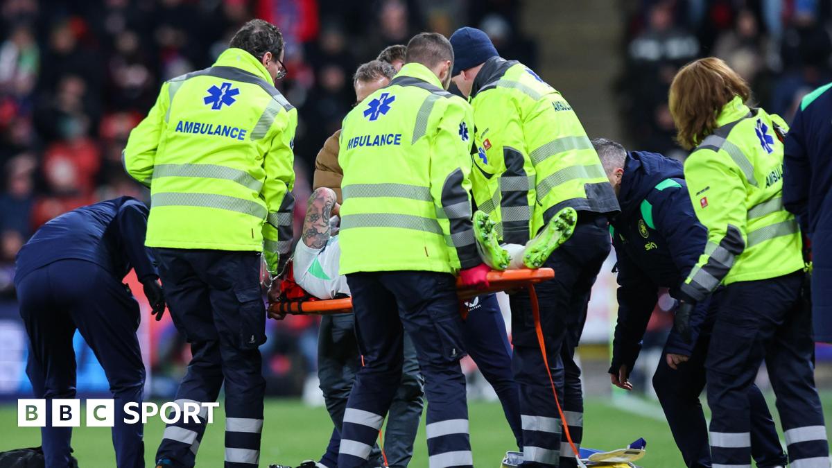 Sammie Szmodics is stretchered off the pitch