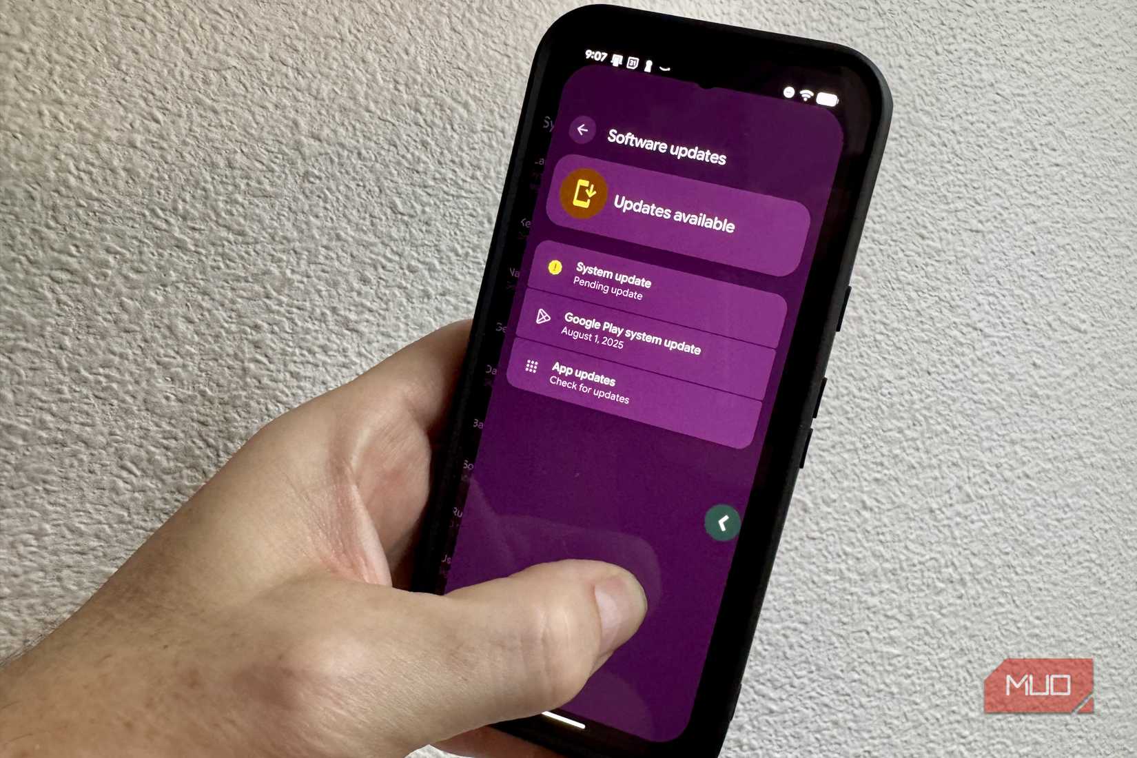 Showing the back gesture on a Pixel 9 held in a hand