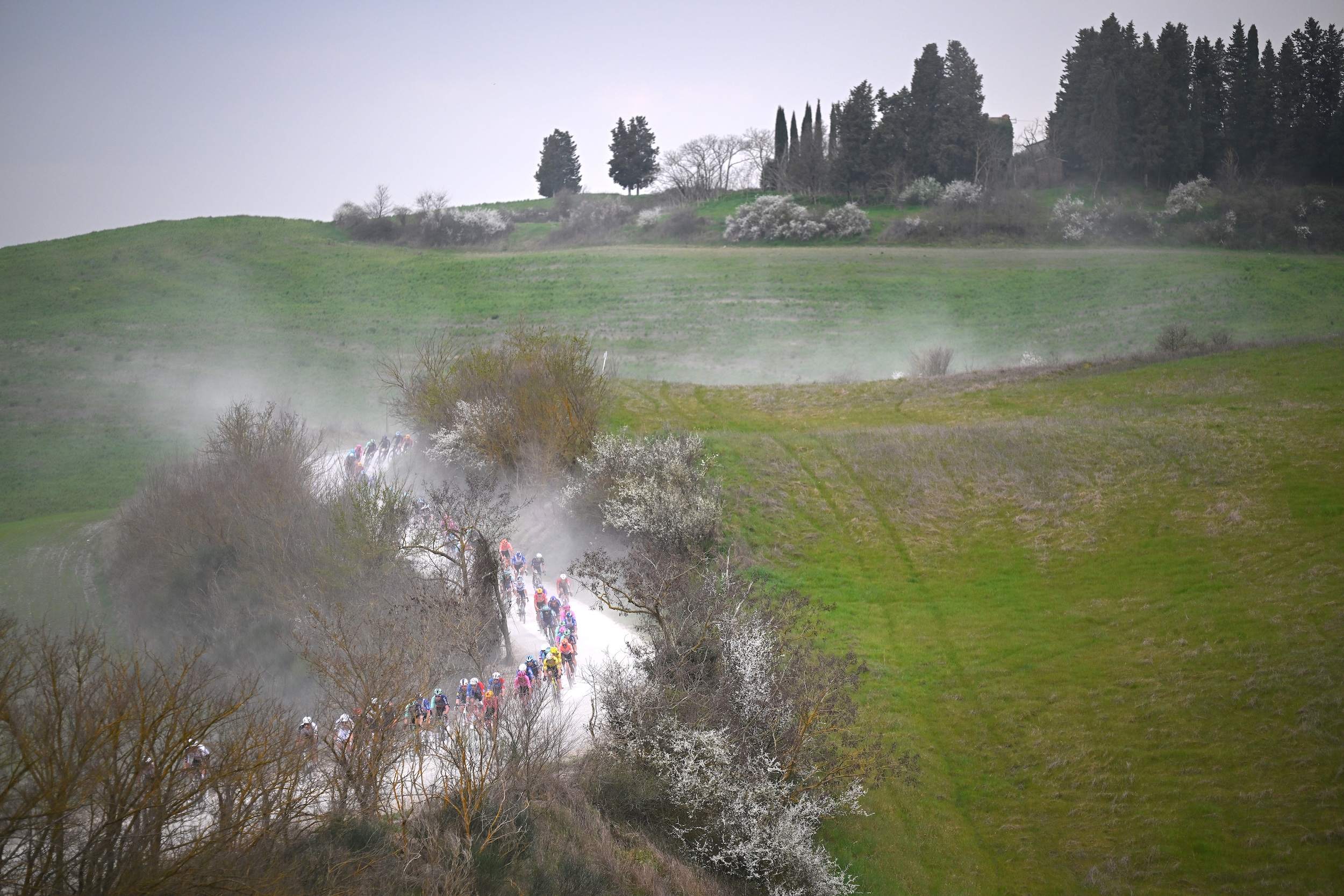 SIENA, ITALY - MARCH 07: A general view of the peloton passing through a landscape during the 20th Strade Bianche 2026 a 203km one day race from Siena to Siena / #UCIWT / on March 07, 2026 in Siena, Italy. (Photo by Tim de Waele/Getty Images)