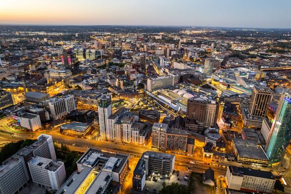 Birmingham United Kingdom Aerial view over the city center by night including central train station Birmingham United Kingdom Aerial view over the city center by night including central train station