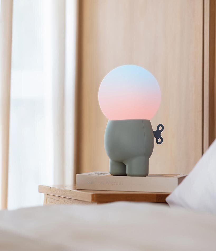 buddy portable mood lamp encourages interaction through a single wind-up key - 1