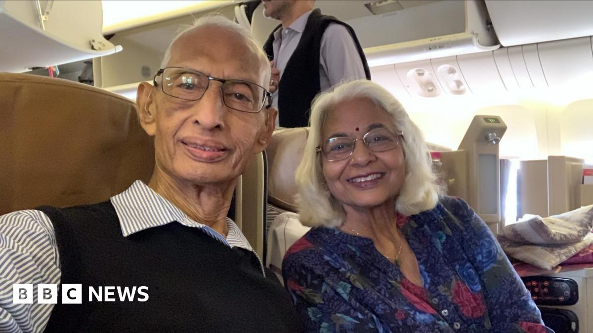 Dinesh and Shashikala Jansari taking a selfie on board an areoplane