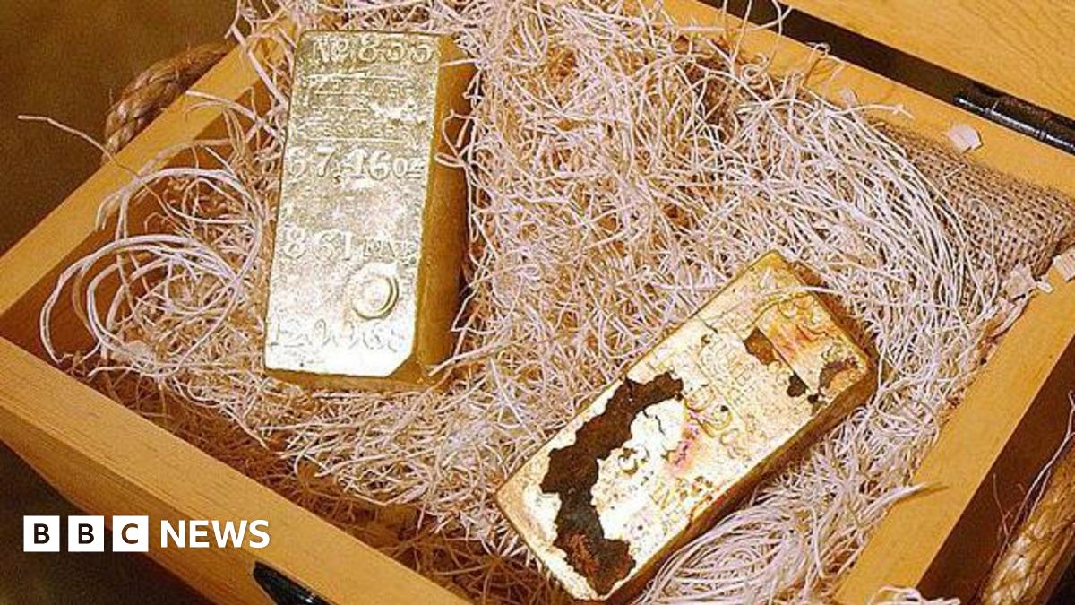 large gold bars inside a wooden case
