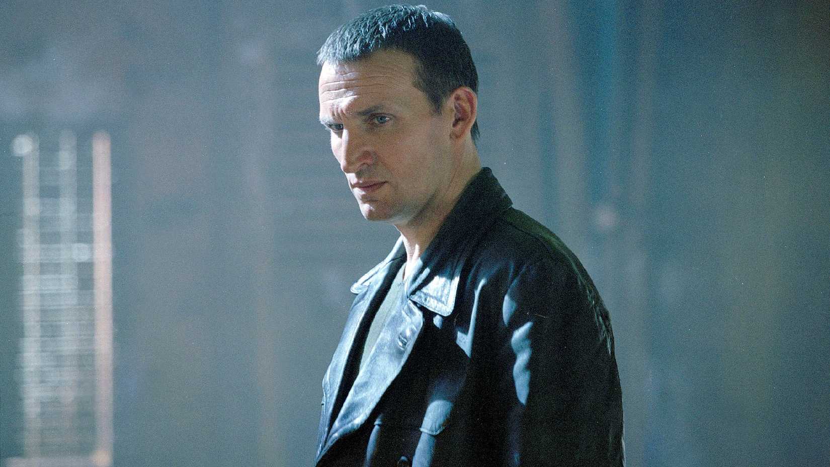 Christopher Eccleston as the Ninth Doctor looking serious in Doctor Who