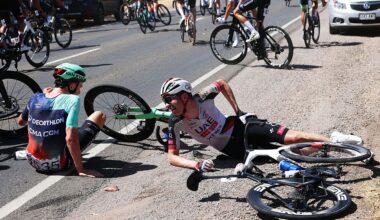 WILLUNGA, AUSTRALIA - JANUARY 24: (L-R) Antoine L&amp;apos;Hote of France and Decathlon CMA CGM Team and Vegard Stake Laengen of Norway and UAE Team Emirates crash during the 26th Santos Tour Down Under 2026, Stage 4 a 130.8km stage from Brighton to Willunga / #UCIWT / on January 24, 2026 in Willunga, Australia. (Photo by Con Chronis/Getty Images)