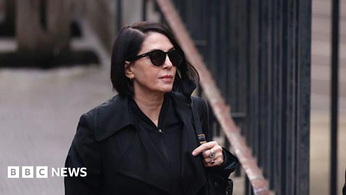 Sadie Frost wearing sunglasses and a black jacket before entering court