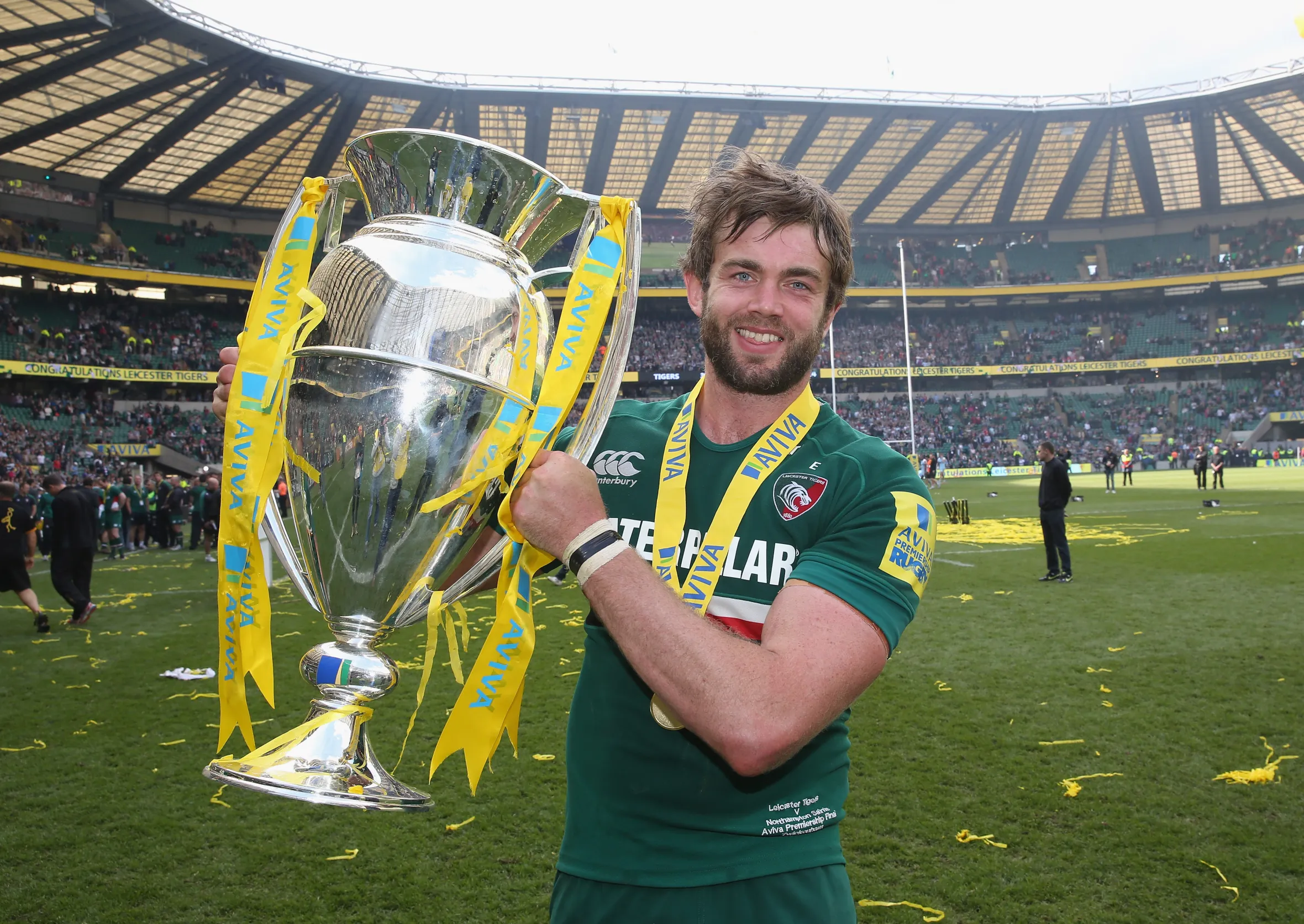 Geoff Parling of Leicester Tigers holding the Aviva Premiership Final trophy.