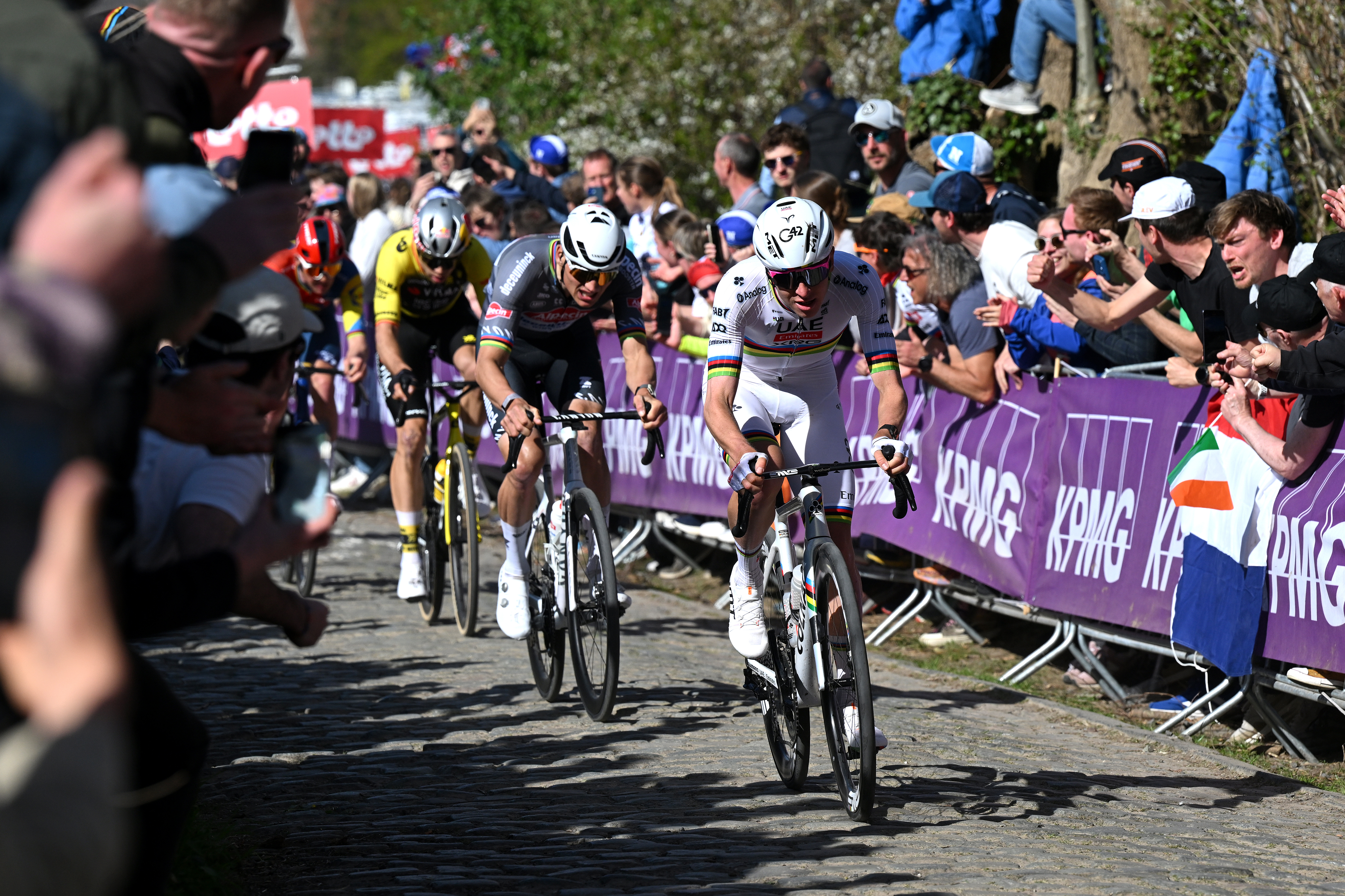 OUDENAARDE, BELGIUM - APRIL 06: Mathieu Van Der Poel of Netherlands and Team Alpecin - Deceuninck, Tadej Pogacar of Slovenia and Team UAE Team Emirates - XRG and Wout Van Aert of Belgium and Team Visma | Lease a Bike compete in the chase group during the 109th Ronde van Vlaanderen - Tour des Flandres 2025 - Men's Elite a 269km one day race from Bruges to Oudenaarde / #UCIWT / on April 06, 2025 in Oudenaarde, Belgium. (Photo by Dario Belingheri/Getty Images)