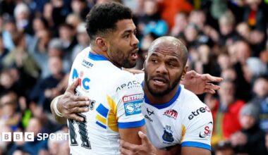 Leeds Rhinos wing Maiko Sivo is hugged by team-mate Kallum Watkins after scoring a try.