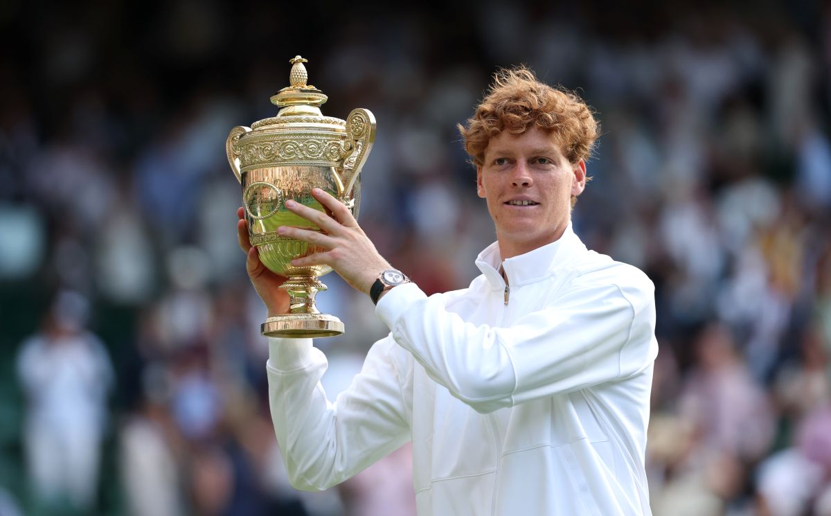 LONDON, ENGLAND - JULY 13: Jannik Sinner of Italy poses with the Gentlemen’s Singles Trophy following his victory against Carlos Alcaraz of Spain during the Gentlemen’s Singles Final on day fourteen of The Championships Wimbledon 2025 at All England Lawn Tennis and Croquet Club on July 13, 2025 in London, England. (Photo by Julian Finney/Getty Images)