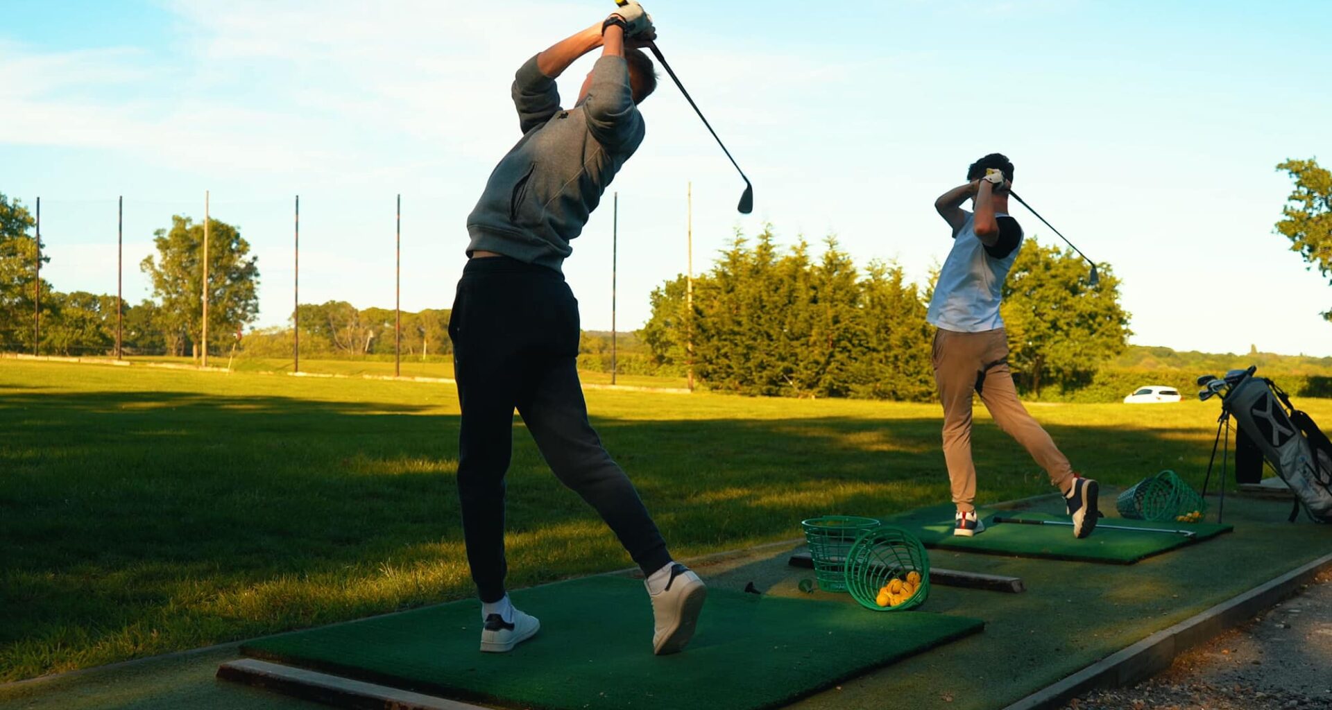 Golfers on a driving range