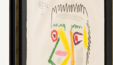 Multi-coloured abstract work by Pablo Picasso showing a face with a red cigarette propped to its mouth.