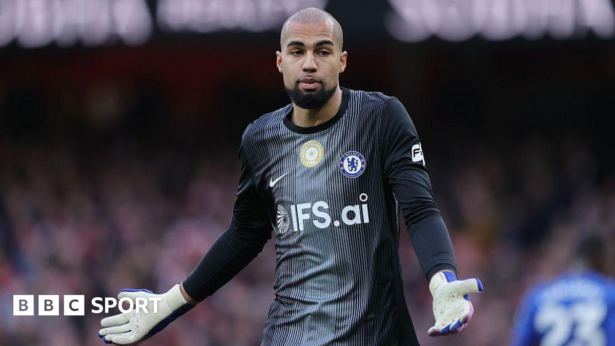 Rob Sanchez shrugging and holding out his arms after Arsenal defeat