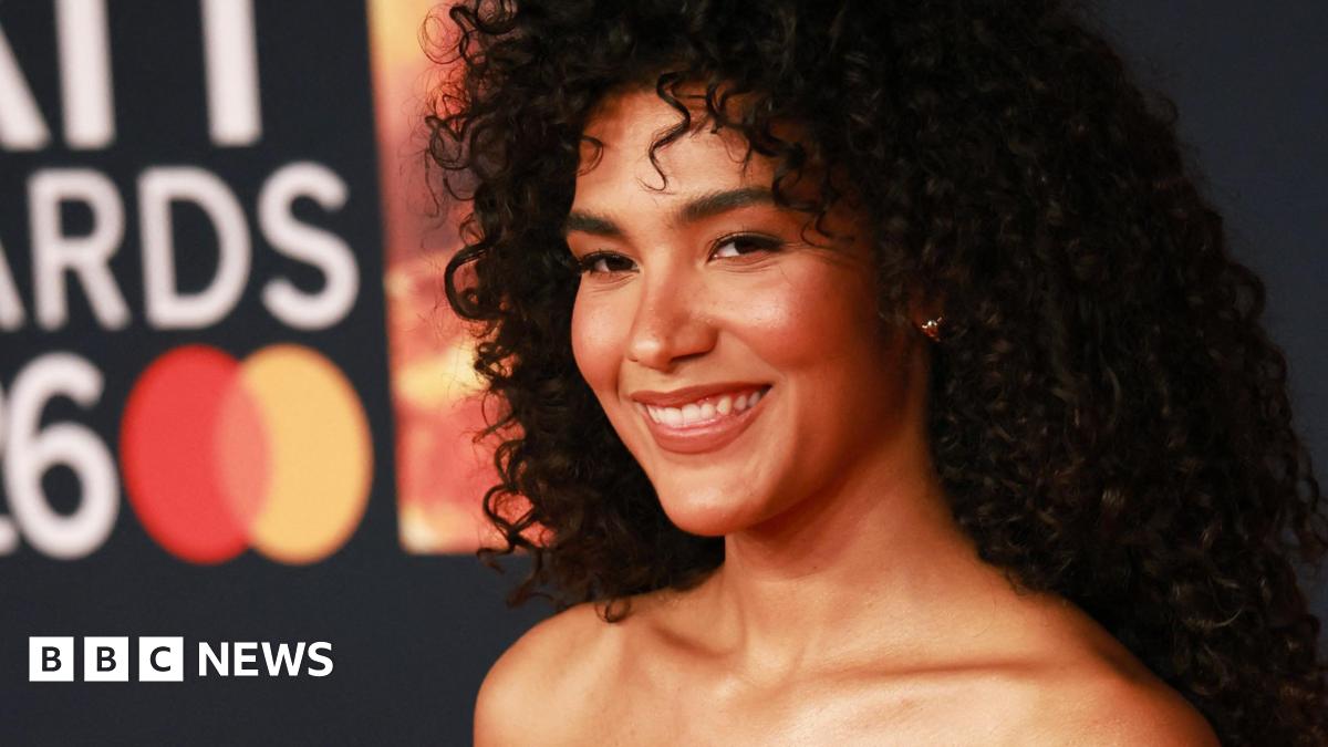 Noel Gallagher speaks as he accepts an award for Songwriter of the Year presented by Bobby Gillespie, during the BRIT Awards at the Co-op Live Arena in Manchester
