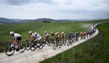 The pack rides during the 20th one-day classic 'Strade Bianche' (White Roads) men's cycling race between Siena and Siena in Tuscany on March 7, 2026. (Photo by Marco BERTORELLO / AFP)