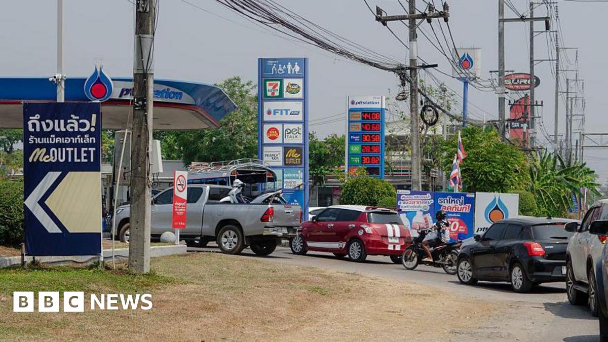 Long queues of vehicles line the road in Mae Sot, west Thailand waiting for fuel amid ongoing supply concerns. Residents in Mae Sot are rushing to buy fuel due to worries about potential shortages and price increases from the conflict in the Middle East.