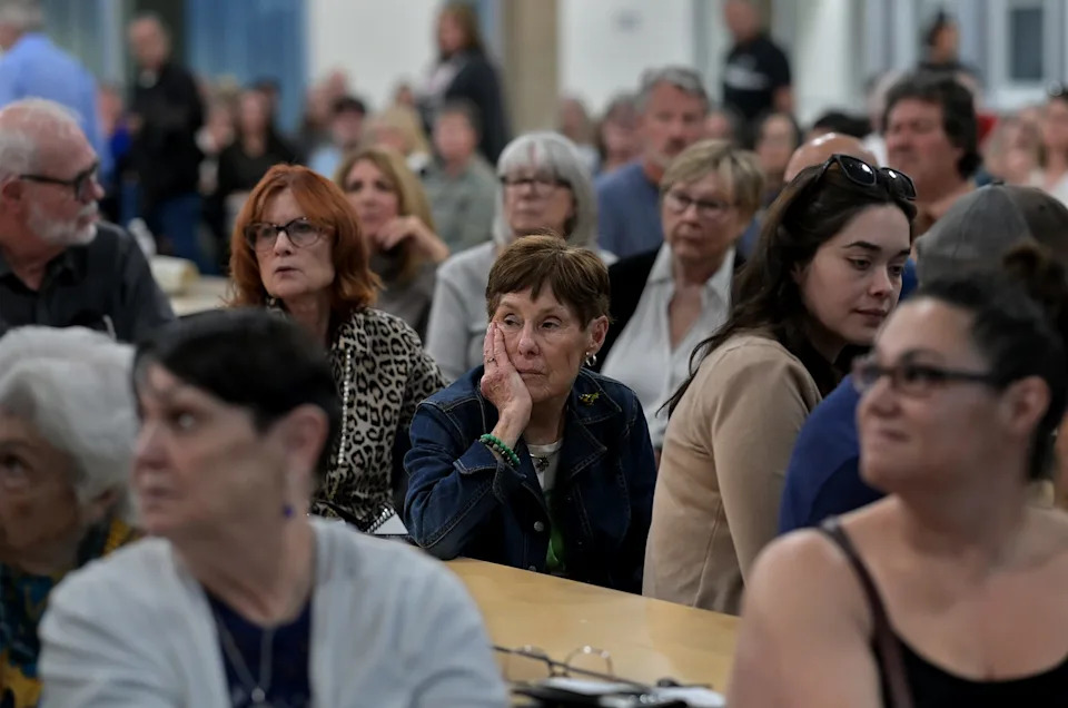 Wingfield Springs residents listen during the Wingfield Springs Community meeting that was held at Sky Ranch Middle School to discuss the proposed project to build 764 residential units on the Red Hawk Golf Course on March 12, 2026.
