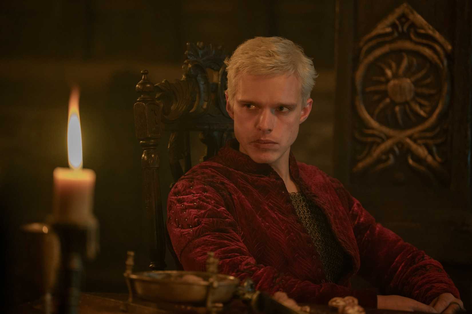 Aerion Targaryen (Finn Bennett), a surly-looking man with a prominent bruise on his mouth and white-blond hair cropped short, in A Knight of the Seven Kingdoms
