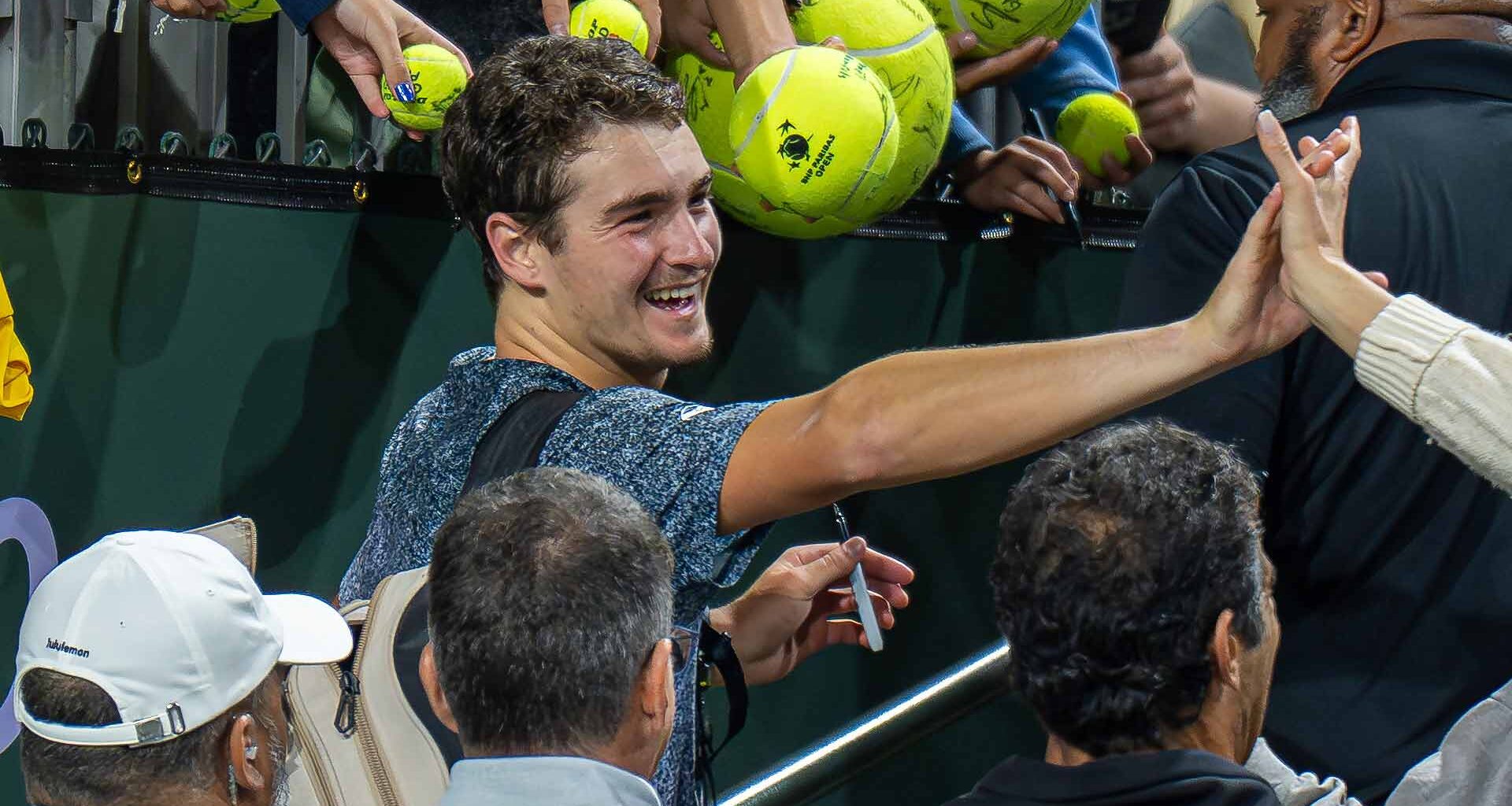 Joao Fonseca thanks the fans after defeating Raphael Collignon Wednesday evening to reach the second round at Indian Wells.