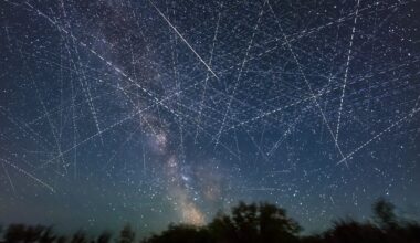 streaks of light crisscross a starry night sky
