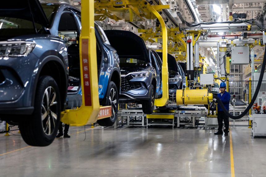 Electric vehicles on the assembly line at the BYD factory in Zhengzhou, China, on November 5, 2025.