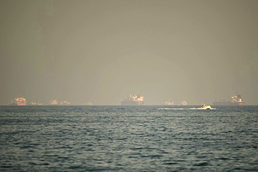 Cargo ships and tankers are seen off coast city of Fujairah, in the Strait of Hormuz in the northern Emirate on February 25.