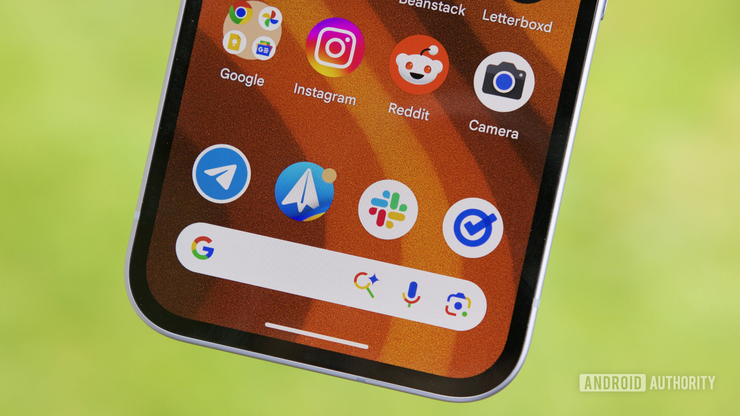 AI Mode icon on the Google Search bar on a Pixel phone.