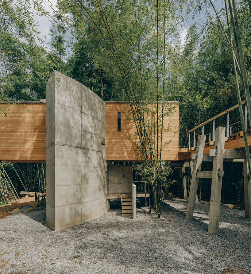 vernacular bridge craftsmanship informs micro-museum set within bamboo grove in china - 5