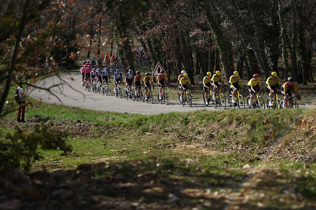 The pack rides during the 6th stage of the Paris-Nice cycling race, 179.3 km between Barbentane and Apt, on March 13, 2026. (Photo by Anne-Christine POUJOULAT / AFP)