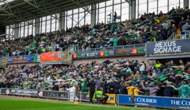 Celtic supporters doing the Huddle