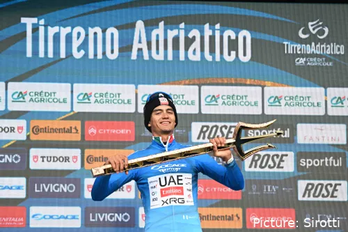 Isaac del Toro poses with the Tirreno-Adriatico trophy