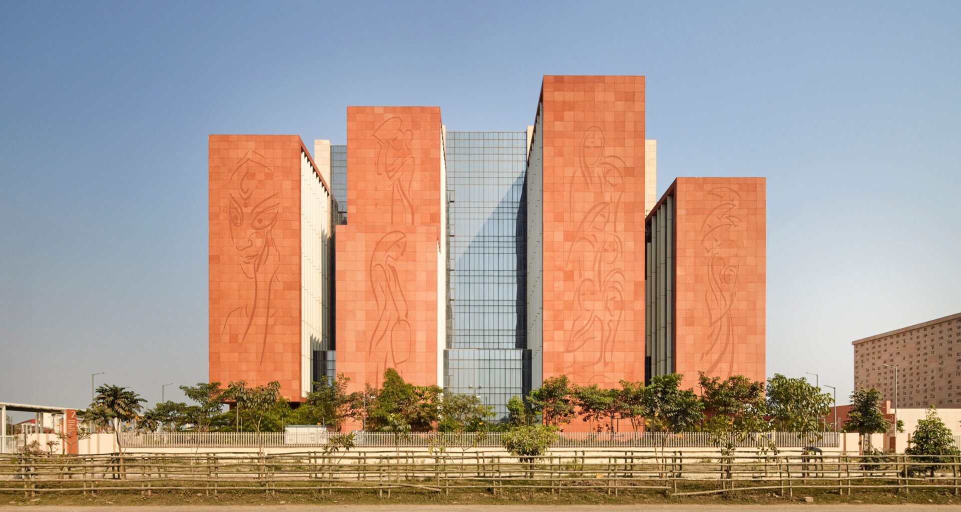 Sandstone murals adorn ITC Green Centre by Morphogenesis