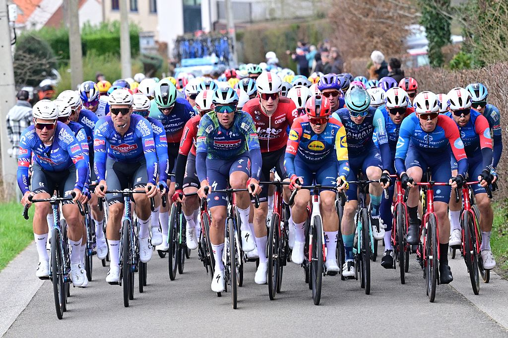 The pack of riders pictured in action during the 78th edition of the men elite race of the Kuurne-Brussels-Kuurne one day cycling race, 195 km from Kuurne to Kuurne via Brussels, Sunday 01 March 2026. BELGA PHOTO DIRK WAEM (Photo by DIRK WAEM / BELGA MAG / Belga via AFP)