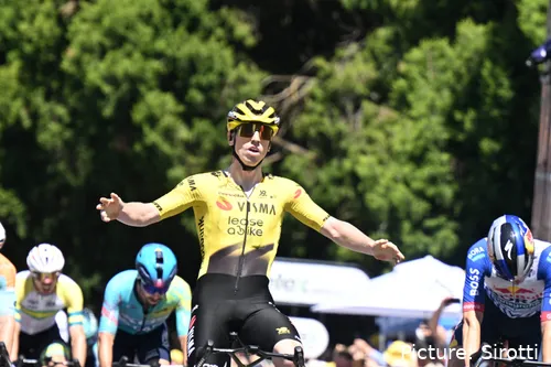Matthew Brennan celebrates his Tour Down Under stage win with his arms aloft