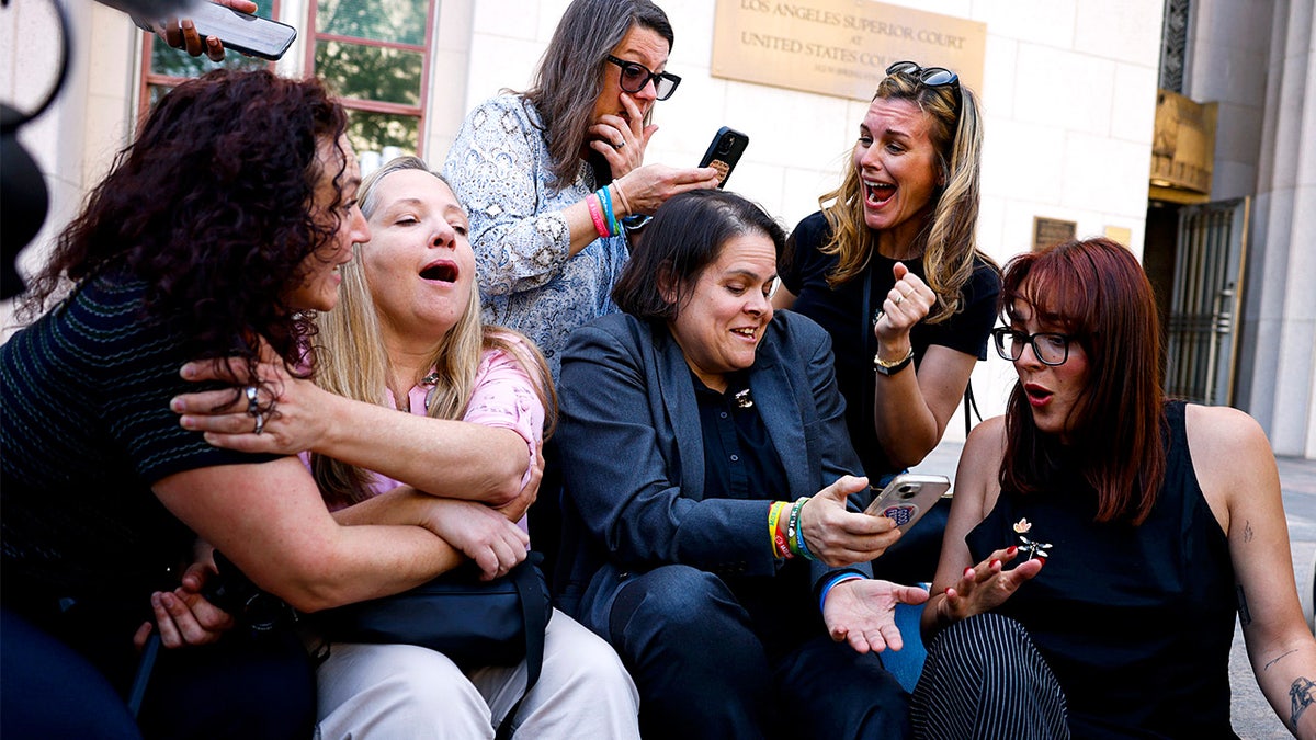 Families and supporters react outside courthouse after social media negligence verdict.