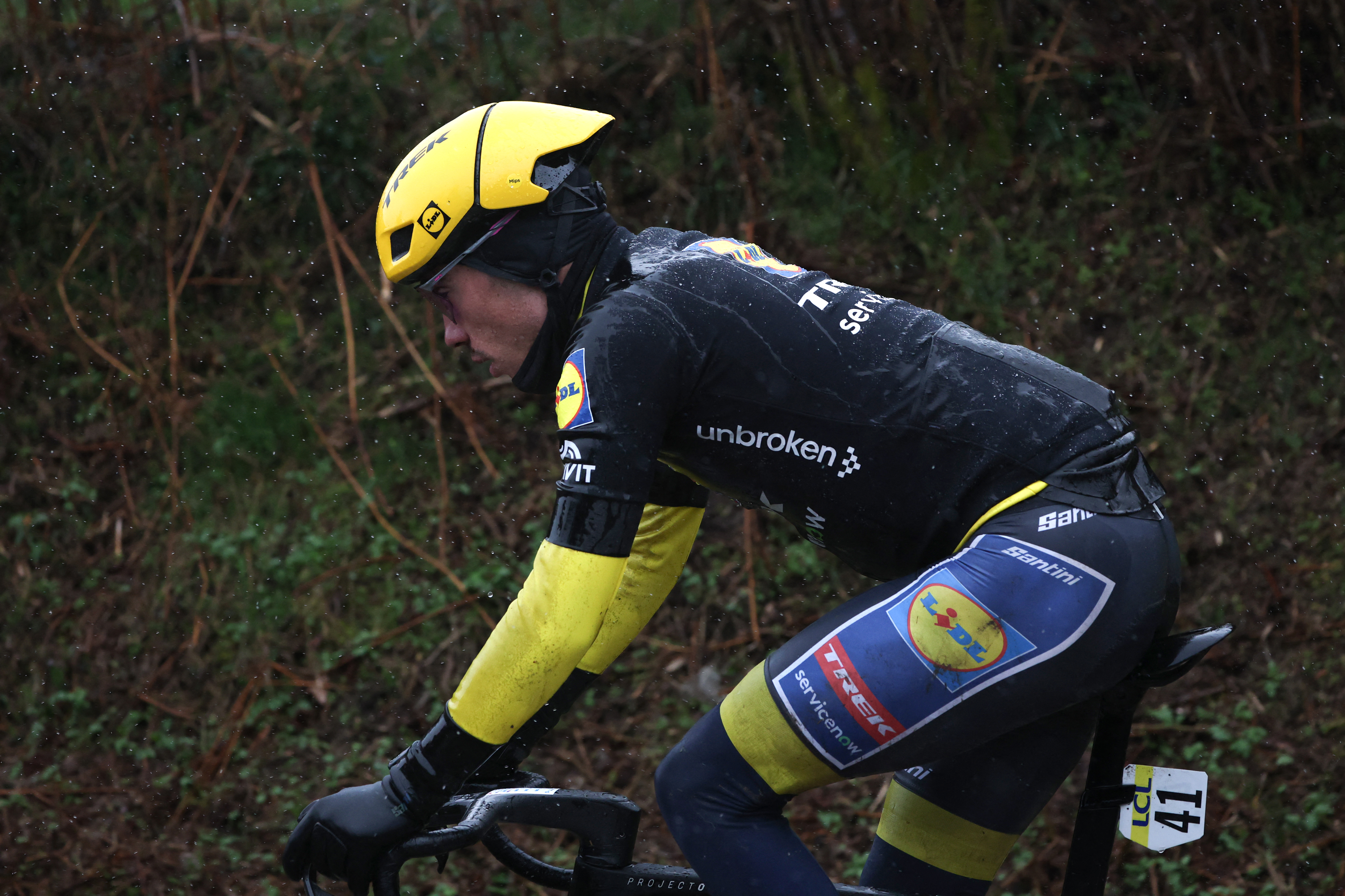 Lidl - Trek's Spanish rider Juan Ayuso, wearing the overall leader yellow jersey, cycles with the leading pack during the 4th stage of the Paris-Nice cycling race, 195 km between Bourges and Uchon, on March 11, 2026. (Photo by Anne-Christine POUJOULAT / AFP via Getty Images)