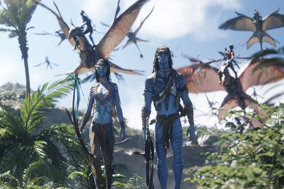 zoe saldana as neytiri, sam worthington as jake sully, avatar fire and ash