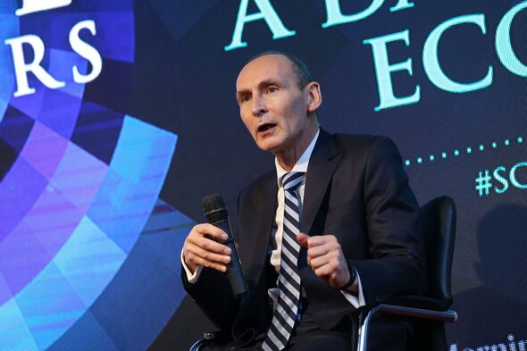 Nigel Green speaks on stage