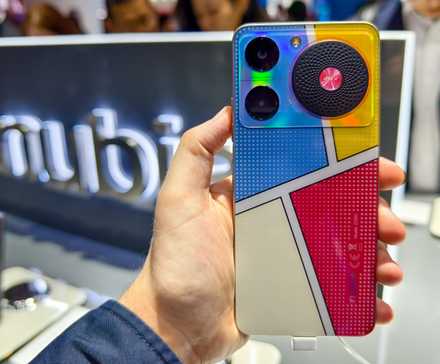 Nubia Music phone at MWC 2024, shown photographed in someone's hand with a Nubia logo sign behind