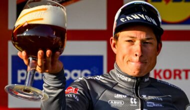 Alpecin-Deceuninck team Belgium's Jasper Philipsen celebrates on the podium after winning the Kuurne-Brussels-Kuurne one day cycling race, 196,9 km from Kuurne to Kuurne via Brussels, on March 2, 2025. (Photo by ERIC LALMAND / Belga / AFP) / Belgium OUT
