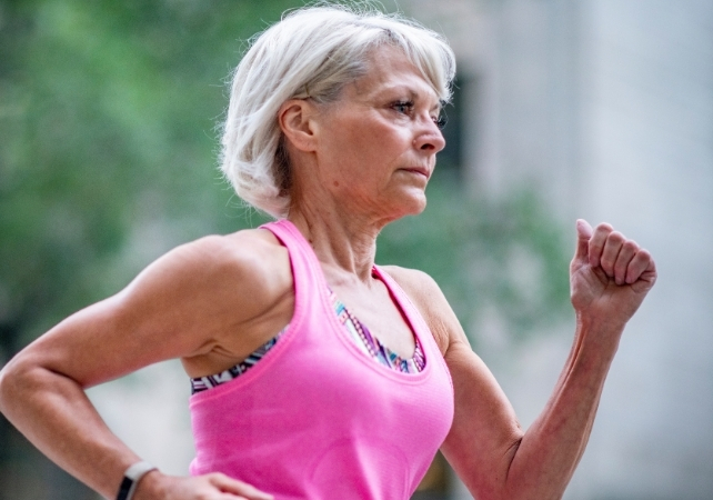Senior woman running outdoors