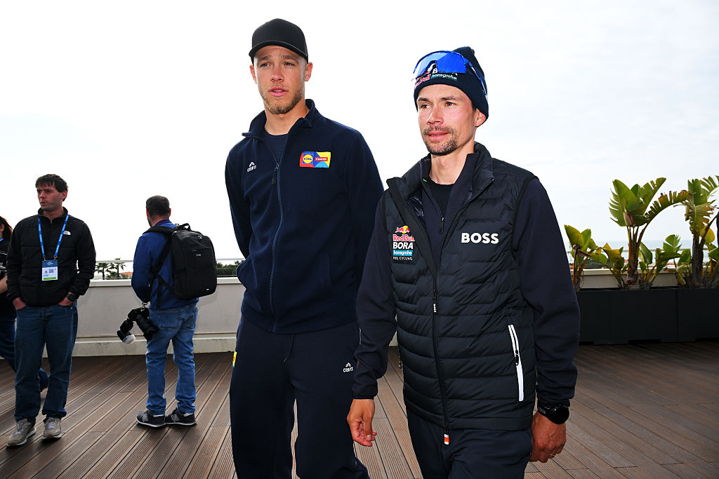 CAMOIRE, ITALY - MARCH 08: (L-R) Jonathan Milan of Italy and Team Lidl - Trek and Primoz Roglic of Slovenia and Team Red Bull Bora Hansgrohe during the Top Riders Press Conference prior to the 61st Tirreno-Adriatico 2026 / #UCIWT / on March 08, 2026 in Camaiore, Italy. (Photo by Tim de Waele/Getty Images)