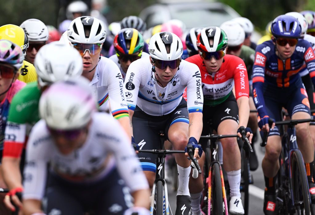 A shot of the peloton at Milan-San Remo Women 2025, with some riders out of focus but Wiebes, centre, in clear focus
