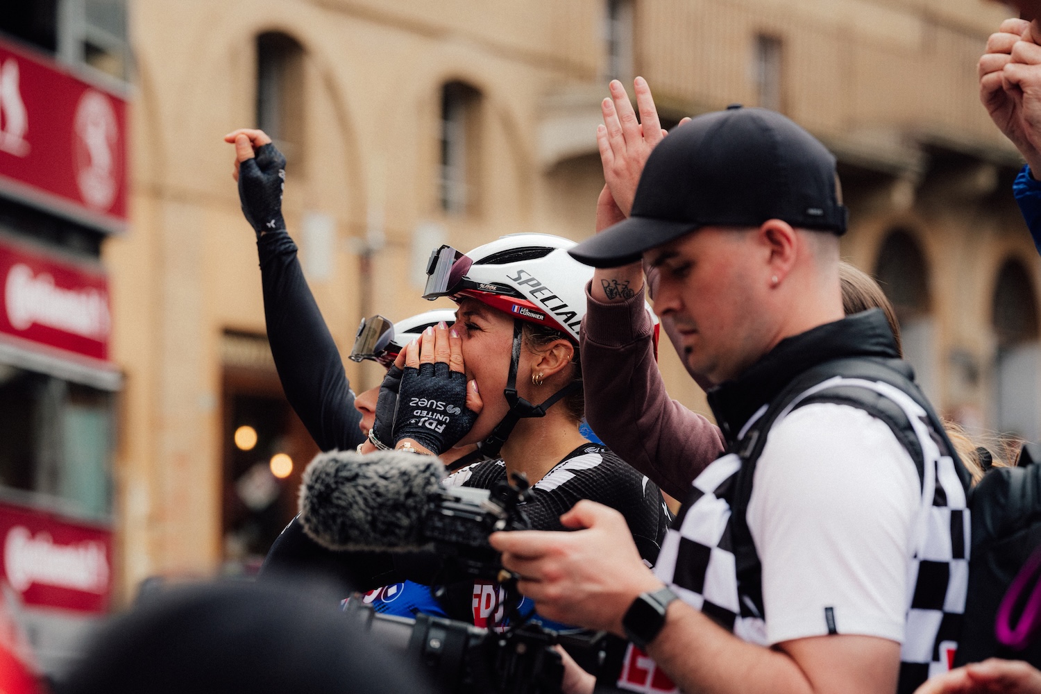 Scenes at the finish of Strade Bianche