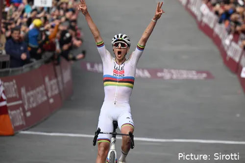 Pogacar raises his arms after winning Strade for the 4th time in his career