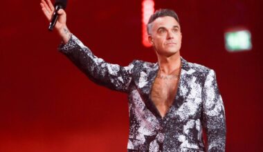 Watch Robbie Williams lead Ozzy Osbourne tribute at BRITs 2026 with 'No More Tears'