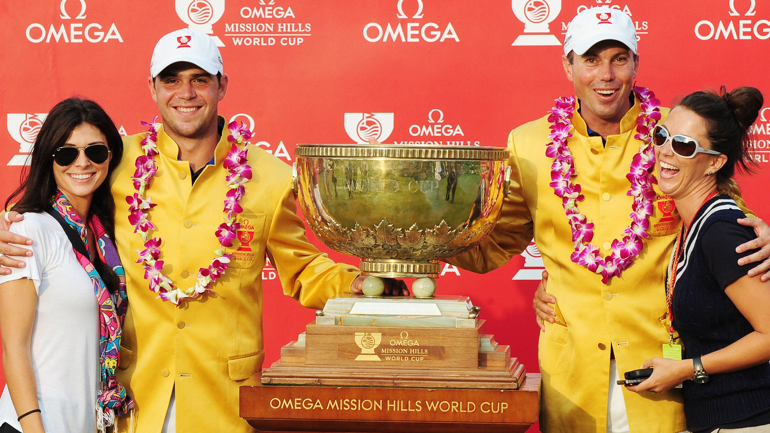 Gary and Gabby Woodland with Matt Kuchar and his partner after the 2011 World Cup
