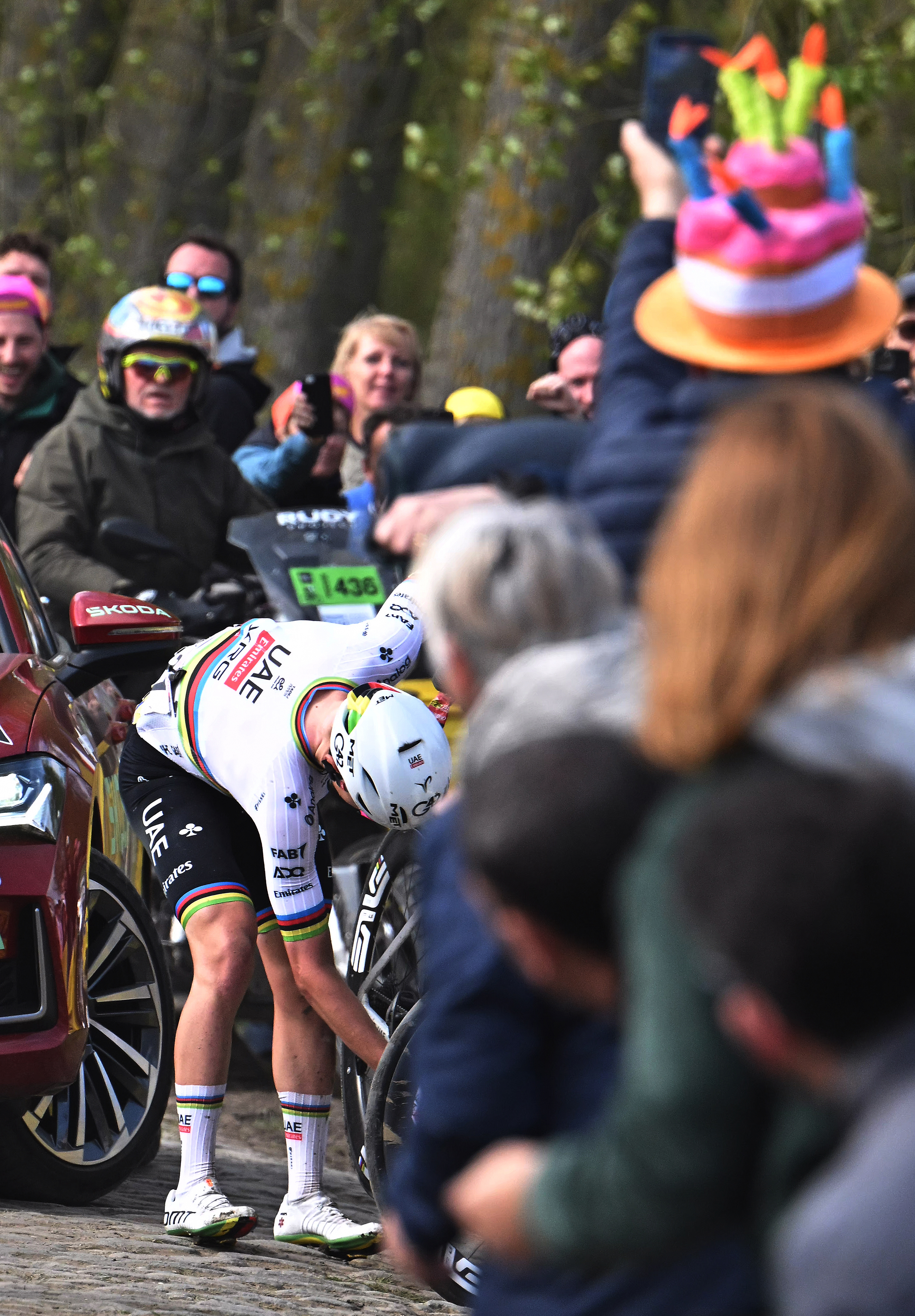 Tadej Pogačar fixing his chain at Paris-Roubaix